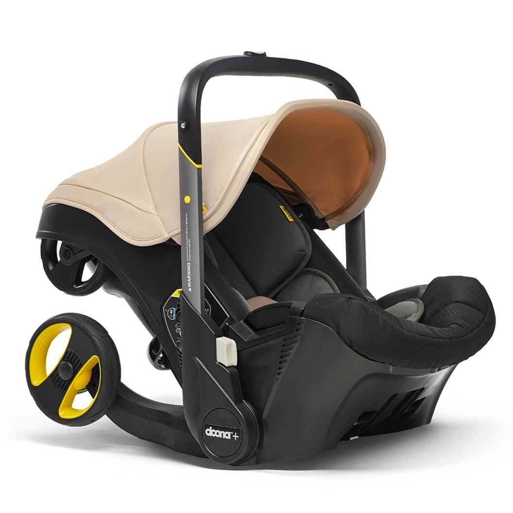 doona from car seat to stroller Doona Infant Car Seat & Stroller Sahara Sand