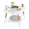 Baby activity center with colorful toys on a white background